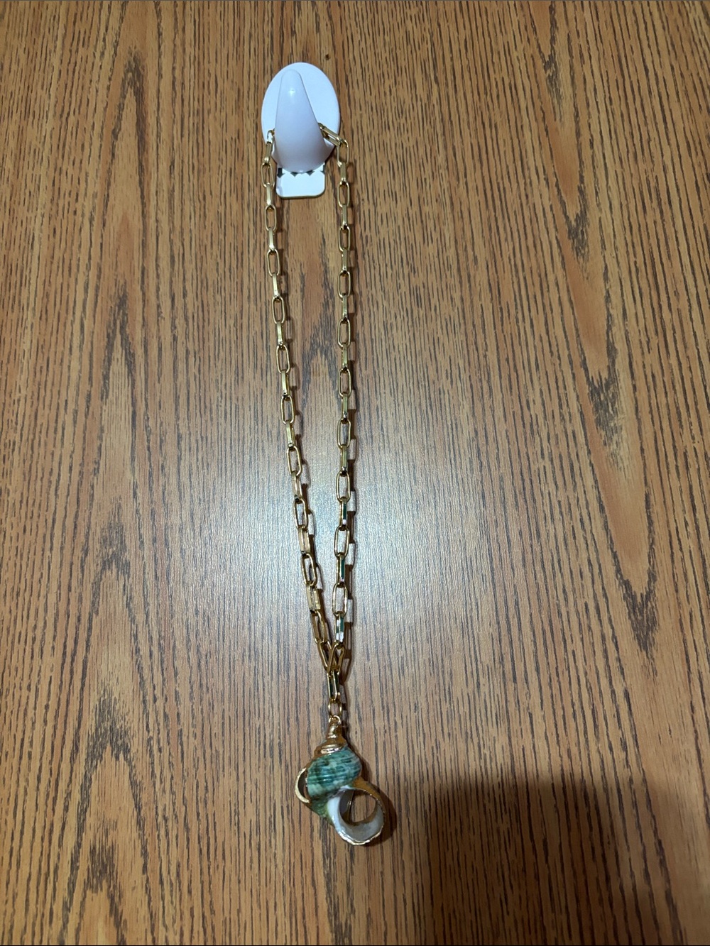Gold-Tone Link Necklace with Green Stone and Circular Pendant